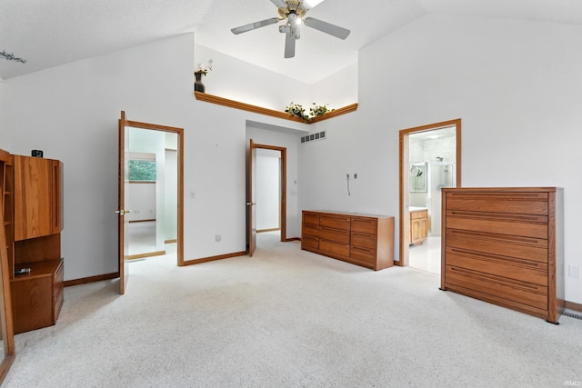 bedroom with light colored carpet, high vaulted ceiling, visible vents, and baseboards