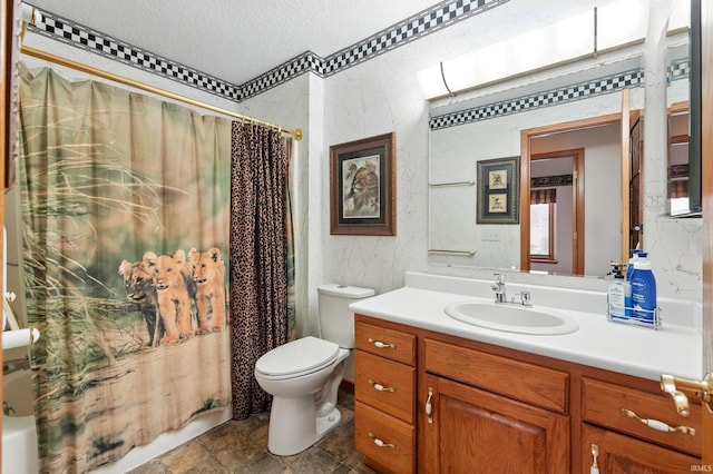 full bathroom featuring vanity, toilet, a textured ceiling, and shower / bath combination with curtain