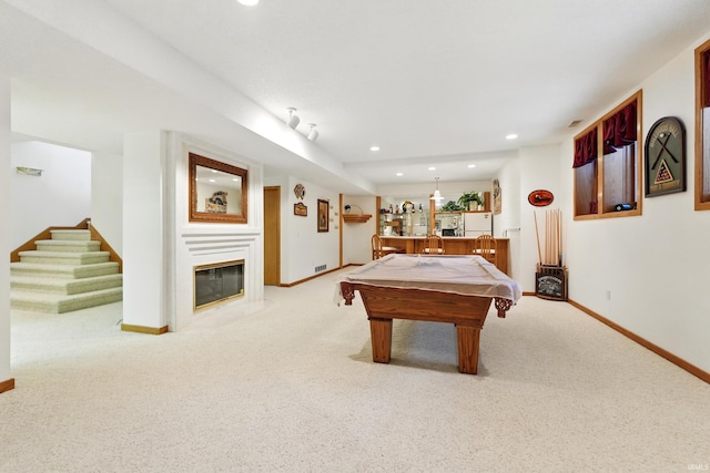 rec room featuring bar, baseboards, carpet, and recessed lighting