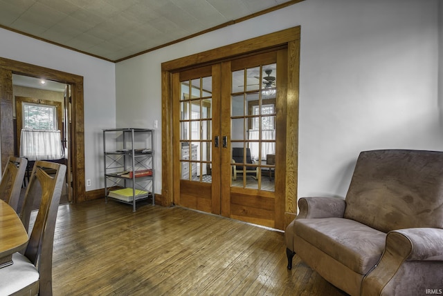 2165 S 625 W, South Whitley, IN 46787 - living area featuring crown molding, baseboards, french doors, and hardwood / wood-style floors
