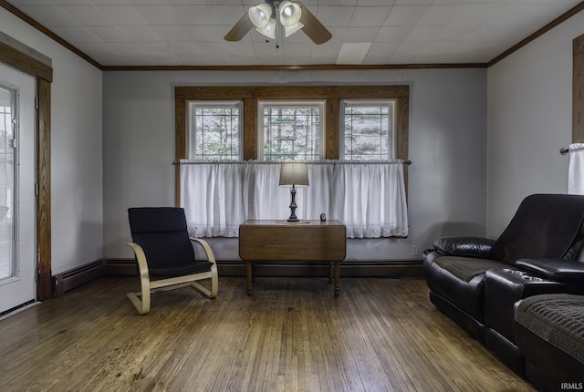 2165 S 625 W, South Whitley, IN 46787 - sitting room featuring ceiling fan, ornamental molding, and hardwood / wood-style flooring