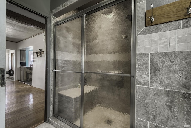 2165 S 625 W, South Whitley, IN 46787 - full bathroom featuring a stall shower and wood finished floors
