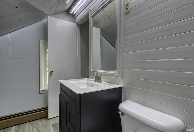 2165 S 625 W, South Whitley, IN 46787 - half bath with vanity, a baseboard heating unit, and toilet