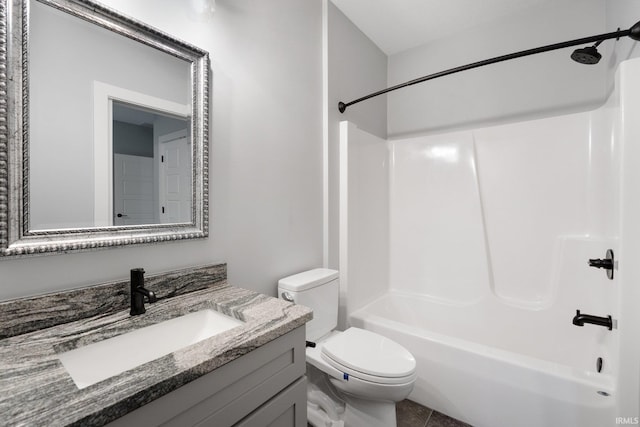 full bathroom with shower / bathtub combination, toilet, tile patterned floors, and vanity