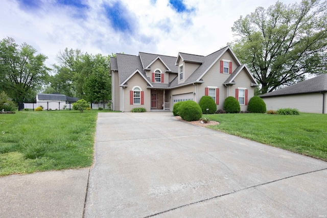 view of front of property featuring a garage, a shingled roof, concrete driveway, and a front lawn