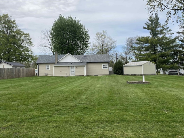 870 W 950 Rd S, Geneva, IN 46740 - back of property with a lawn and fence