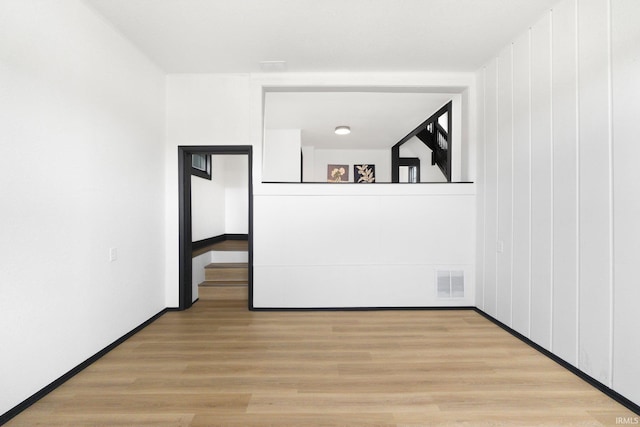 1820 W Main St, Fort Wayne, IN 46808 - unfurnished room with visible vents and light wood-style flooring