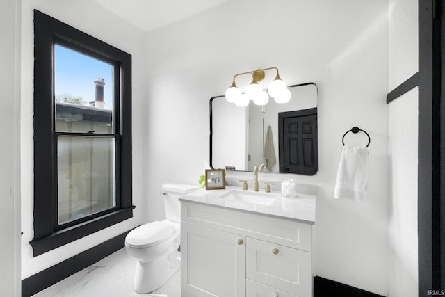 1820 W Main St, Fort Wayne, IN 46808 - bathroom with vanity, marble finish floor, and toilet