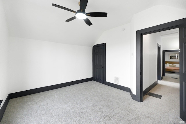 1820 W Main St, Fort Wayne, IN 46808 - additional living space with light colored carpet, a ceiling fan, lofted ceiling, and visible vents