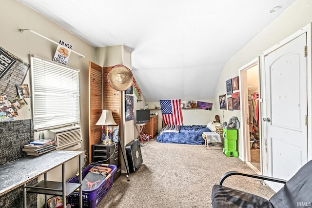 carpeted bedroom featuring lofted ceiling