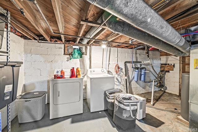 laundry room featuring washing machine and clothes dryer and laundry area