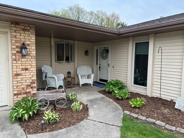 8615 Timbermill Pl, Fort Wayne, IN 46804 - view of exterior entry featuring brick siding