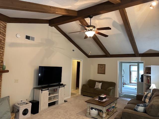 8615 Timbermill Pl, Fort Wayne, IN 46804 - living area featuring ceiling fan, light carpet, beam ceiling, and high vaulted ceiling