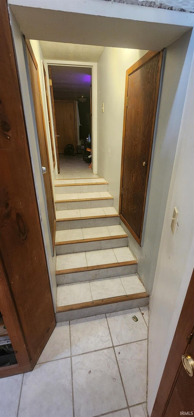 321 S Court St, Sullivan, IN 47882 - staircase featuring tile patterned floors