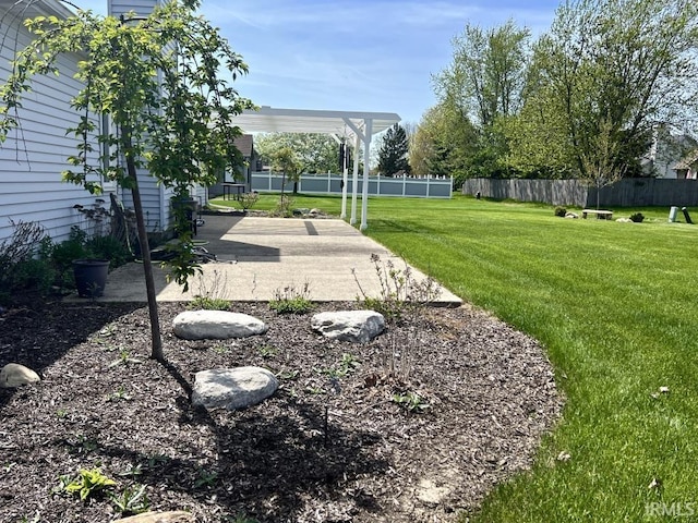 view of yard with a patio and fence