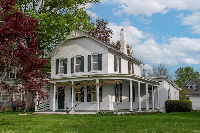113 W N Shore Dr, South Bend, IN 46617 - farmhouse-style home featuring a porch, brick siding, a front yard, and a chimney