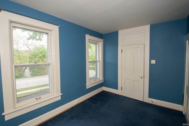 113 W N Shore Dr, South Bend, IN 46617 - unfurnished room featuring dark carpet and baseboards