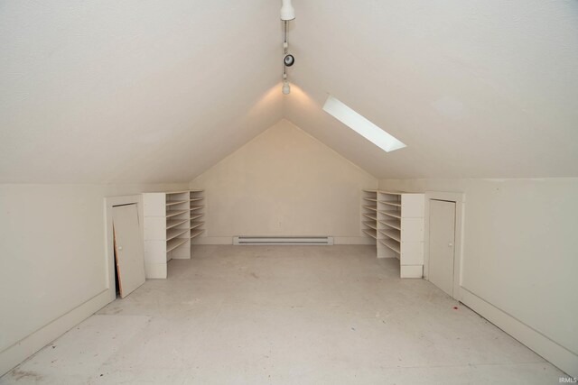 113 W N Shore Dr, South Bend, IN 46617 - additional living space with vaulted ceiling with skylight and a baseboard radiator