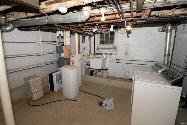 113 W N Shore Dr, South Bend, IN 46617 - unfinished basement with washing machine and clothes dryer, a sink, and water heater