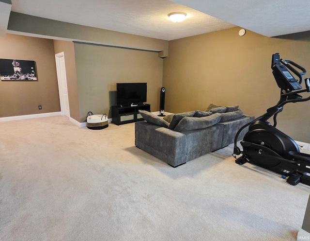 carpeted living room featuring baseboards