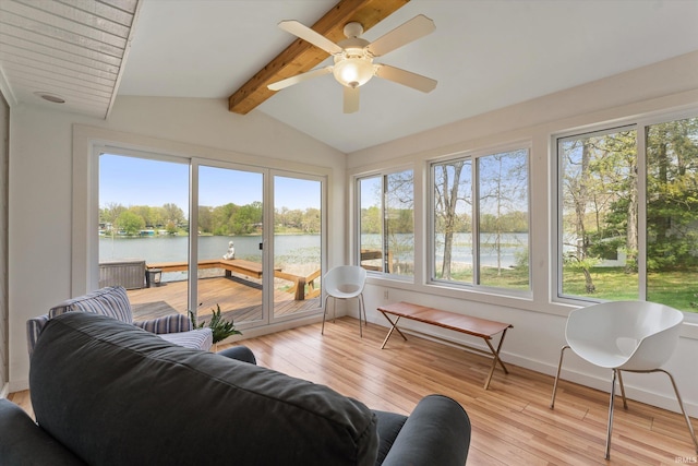 15860 Cook Lake Trl, Plymouth, IN 46563 - sunroom featuring vaulted ceiling with beams, baseboards, a deck with water view, and hardwood / wood-style flooring