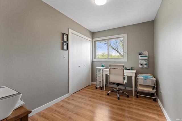 15860 Cook Lake Trl, Plymouth, IN 46563 - home office with baseboards and light wood-style flooring