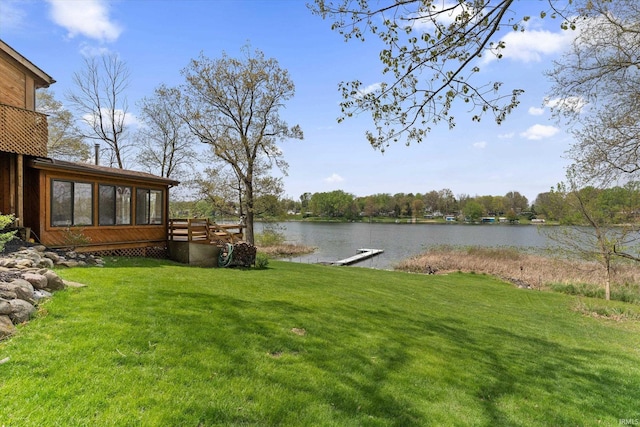 15860 Cook Lake Trl, Plymouth, IN 46563 - view of yard featuring a boat dock, a water view, and a sunroom