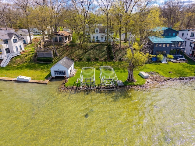 birds eye view of property with a residential view