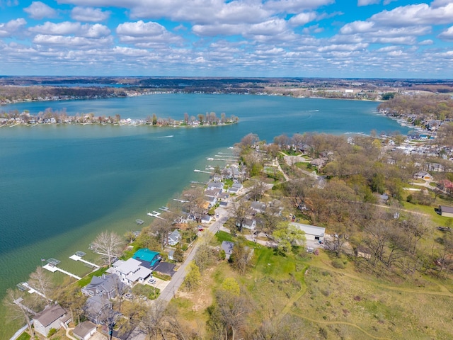 aerial view with a water view and a residential view