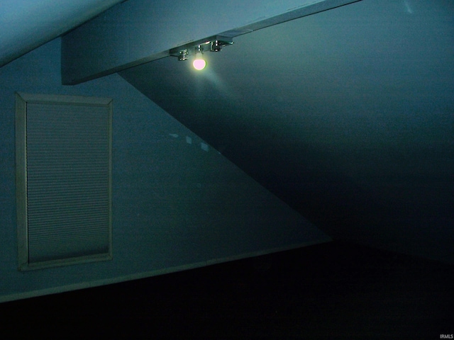interior space featuring vaulted ceiling