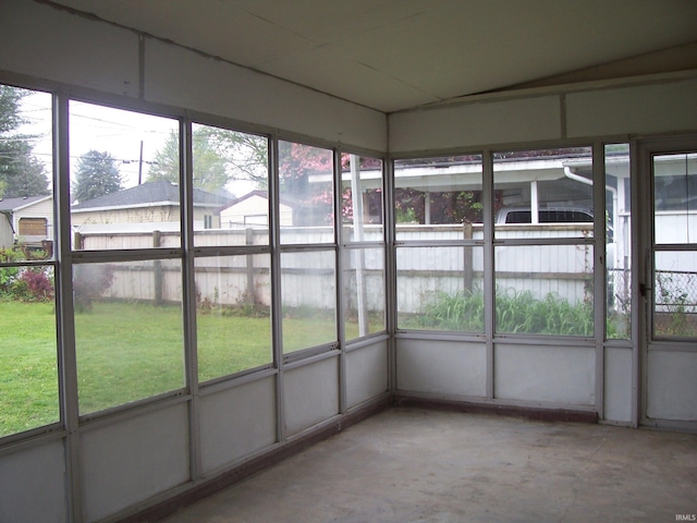unfurnished sunroom with a wealth of natural light