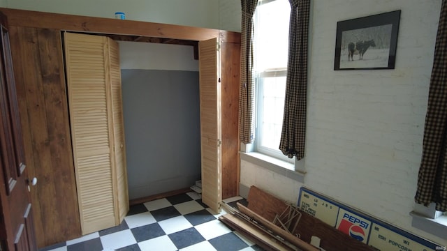 interior space with tile patterned floors