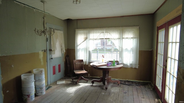 interior space with a healthy amount of sunlight and hardwood / wood-style flooring