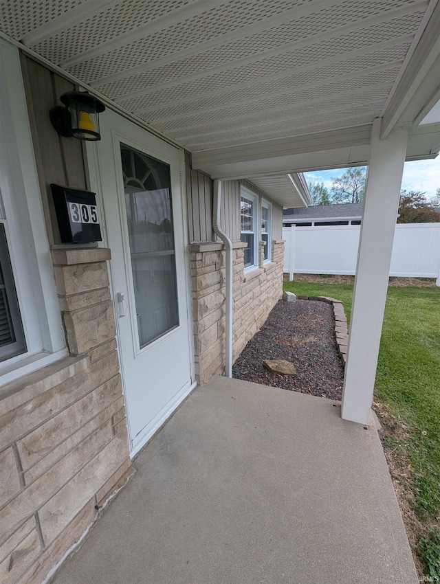 view of patio / terrace featuring fence