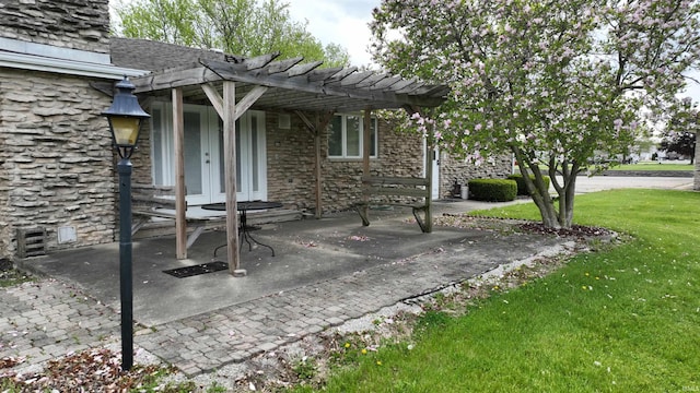 view of patio / terrace with a pergola and french doors