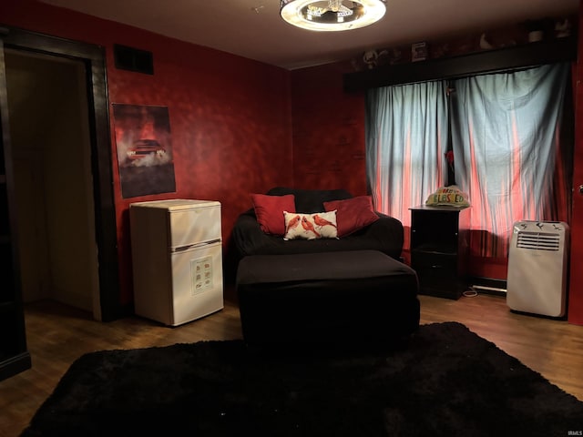 705 Lehman St, Berne, IN 46711 - bedroom featuring refrigerator and wood finished floors
