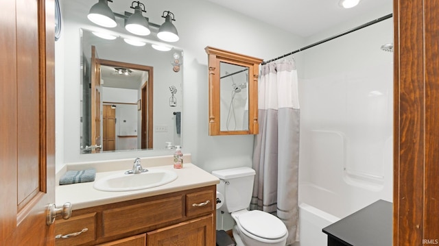 full bathroom featuring vanity and toilet