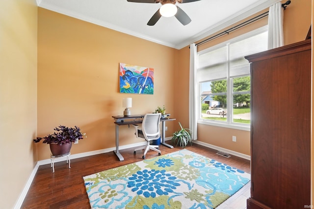 office space with ornamental molding, wood finished floors, baseboards, and ceiling fan
