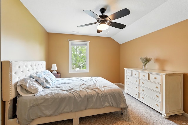 bedroom featuring light colored carpet, ceiling fan, and lofted ceiling