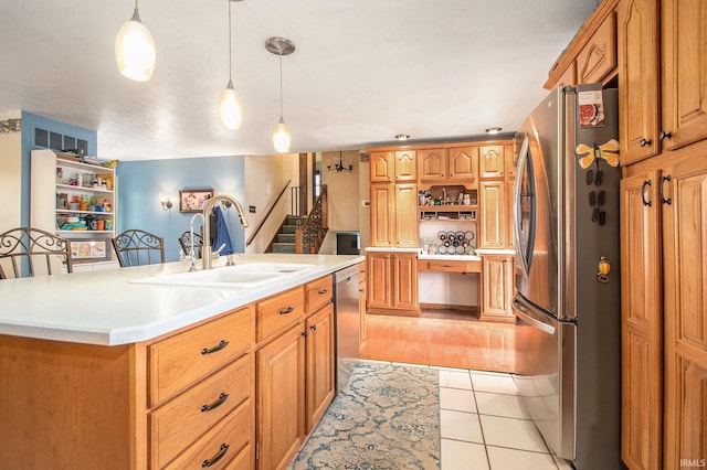 kitchen with light countertops, stainless steel appliances, open shelves, and a sink