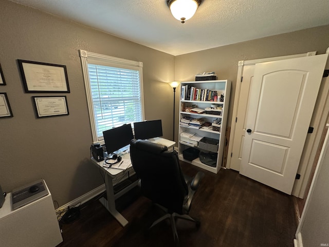 office featuring dark wood-style flooring and baseboards
