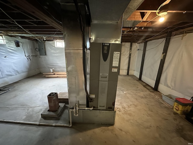 basement featuring heating unit