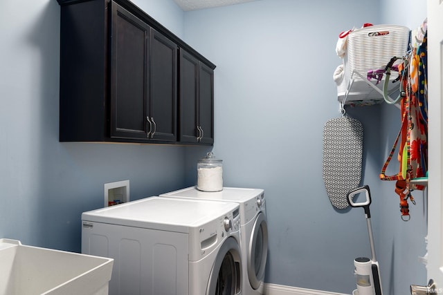 5138 Indigo Ave, Lafayette, IN 47909 - laundry room featuring a sink, cabinet space, and washer and dryer