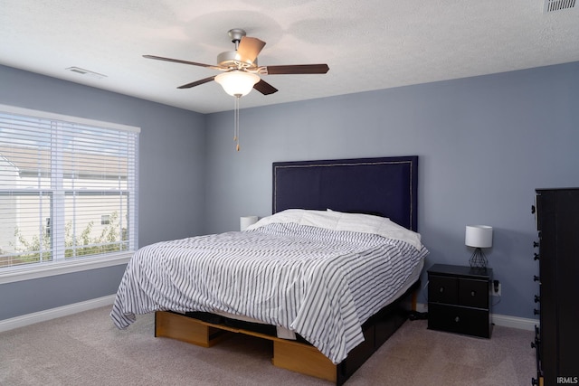 5138 Indigo Ave, Lafayette, IN 47909 - carpeted bedroom with visible vents, baseboards, and ceiling fan