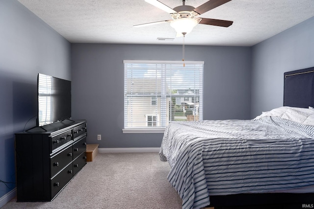 5138 Indigo Ave, Lafayette, IN 47909 - carpeted bedroom featuring baseboards, visible vents, a ceiling fan, and a textured ceiling