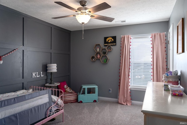5138 Indigo Ave, Lafayette, IN 47909 - bedroom with a textured ceiling, multiple windows, visible vents, and carpet