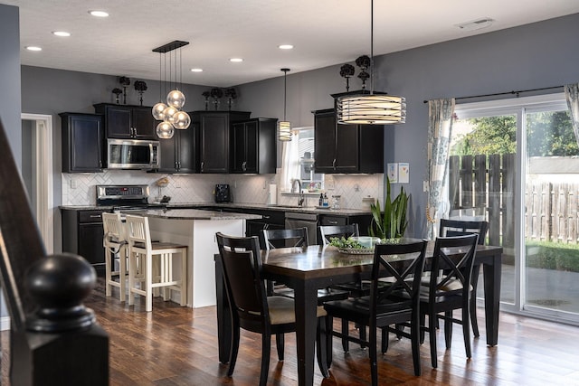 5138 Indigo Ave, Lafayette, IN 47909 - dining room featuring dark wood finished floors, visible vents, and recessed lighting