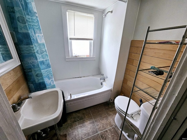 full bath with toilet and a sink