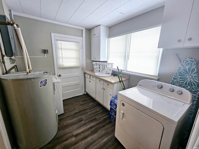 laundry area with dark wood-style flooring, a wealth of natural light, washer / clothes dryer, and gas water heater