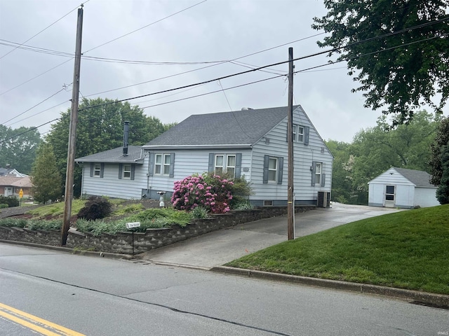 388 Schuetter Rd, Jasper, IN 47546 - view of front of home featuring roof with shingles, a front lawn, and driveway